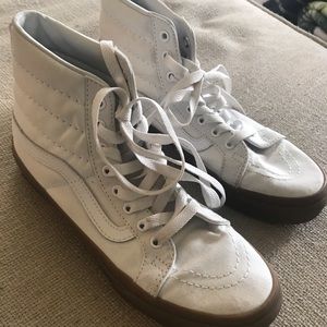 Woman’s white Vans